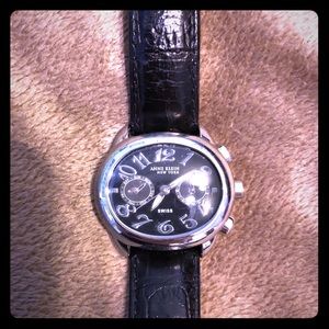 Oval Anne Klein watch with black leather band